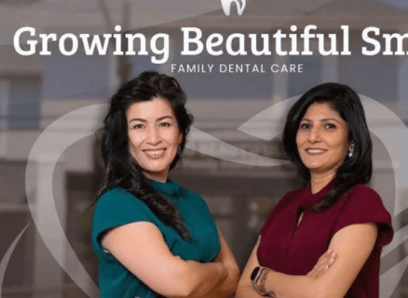 Two members of the Growing Beautiful Smiles team